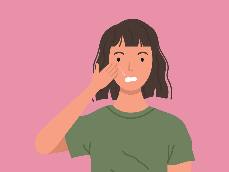 Como tirar cicatriz no rosto? Ilustração de menina com a mão na cicatriz na bochecha, pensando em como tirar cicatrizes no rosto